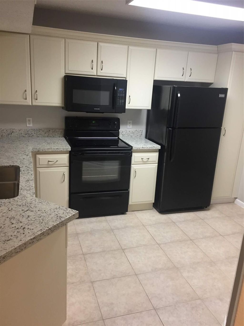 Photo of 8721 Wiles Rd #102, Coral Springs, FL 33067 (MLS # F10447064)