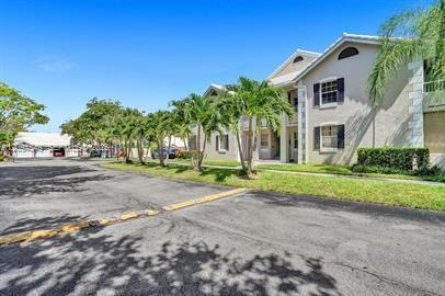 Photo of 2871 N Oakland Forest Drive #210, Oakland Park, FL 33309 (MLS # A12094549)