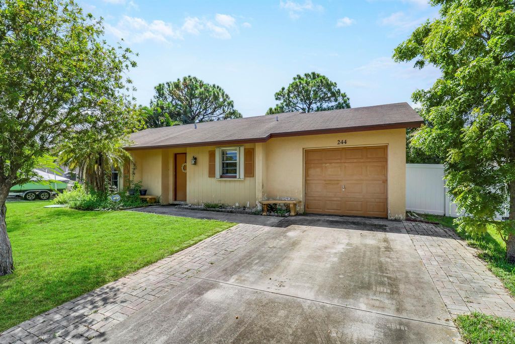 Photo of 244 SW Holden Terrace, Port Saint Lucie, FL 34984 (MLS # R11013623)