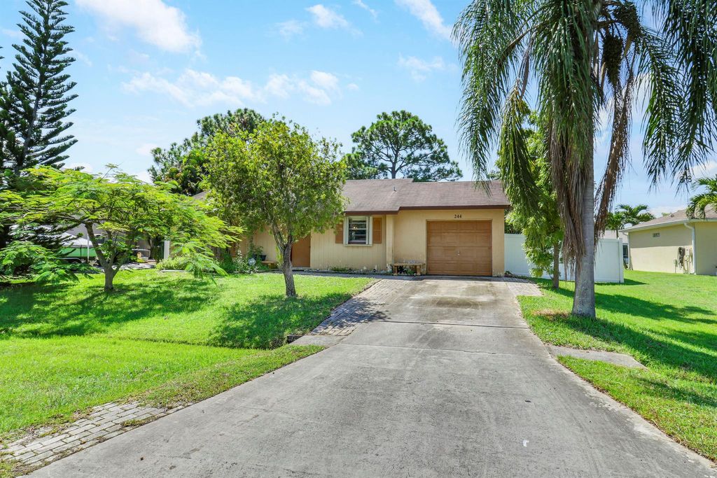 Photo of 244 SW Holden Terrace, Port Saint Lucie, FL 34984 (MLS # R11013623)