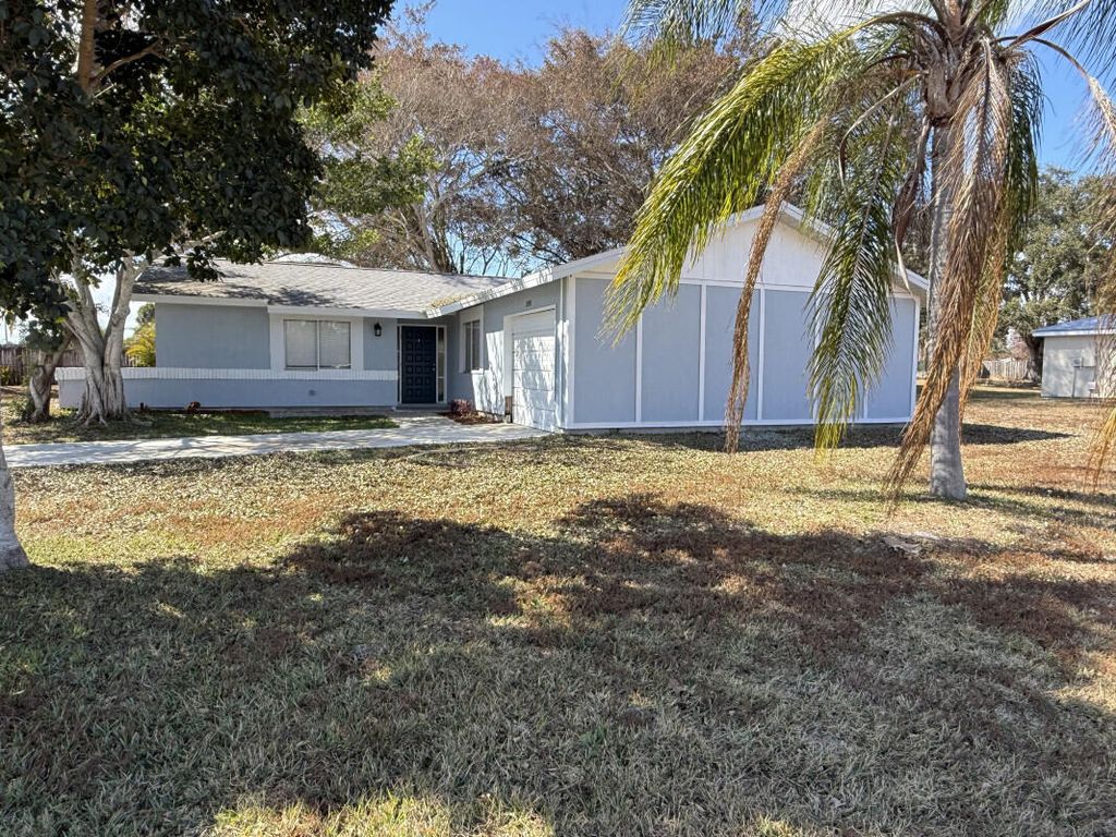 Photo of 2092 SE Talwood Lane, Port Saint Lucie, FL 34952 (MLS # R11169951)