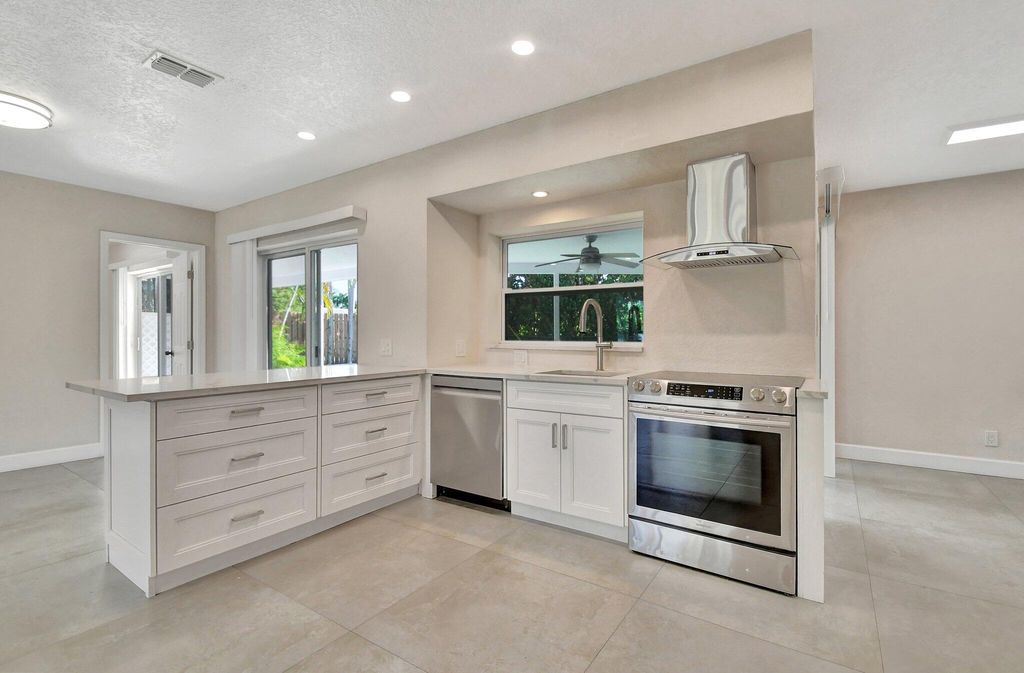 Photo of 1060 NW 6th Terrace, Boca Raton, FL 33486 (MLS # R11103265)