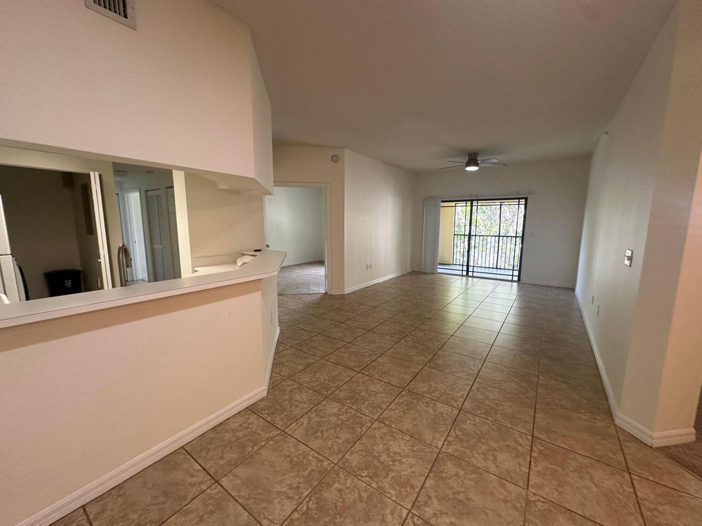 Photo of 3020 Alcazar Place #303, Palm Beach Gardens, FL 33410 (MLS # R11002923)