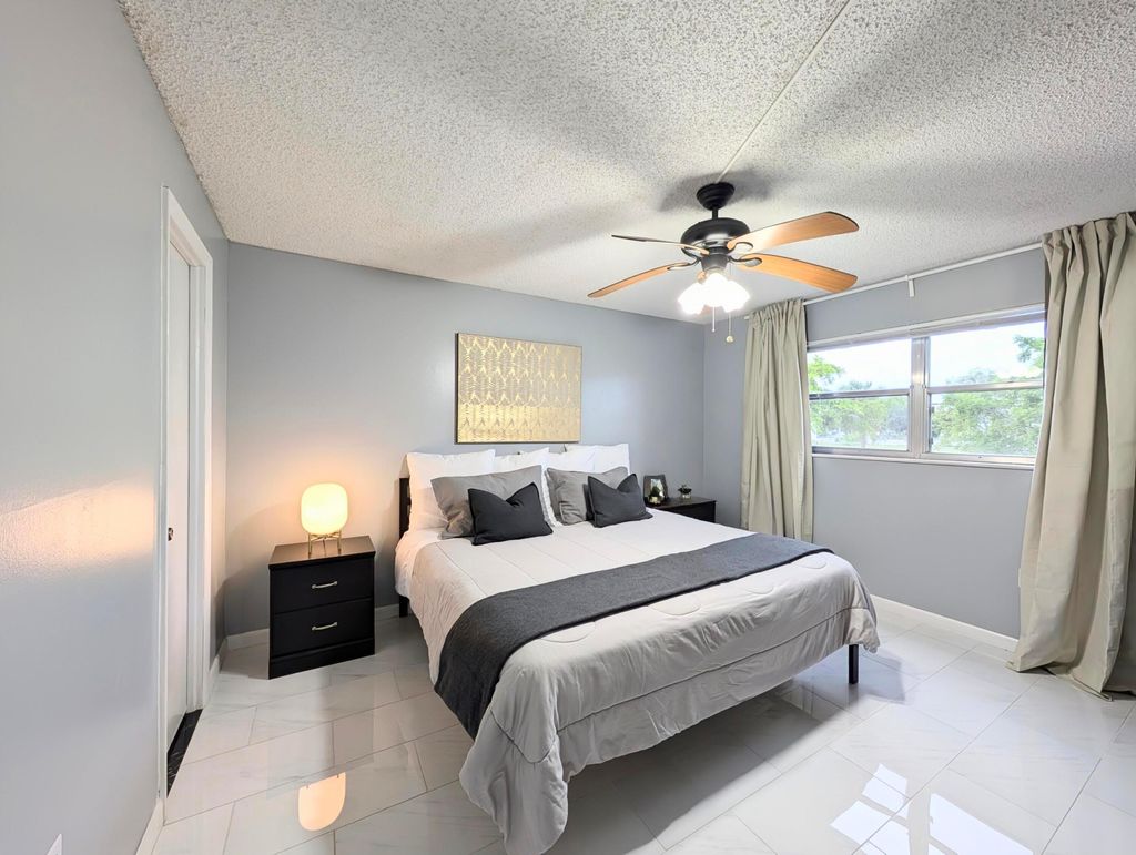 Photo of 8021 Sunrise Lakes Drive N #203, Sunrise, FL 33322 (MLS # B26002475)