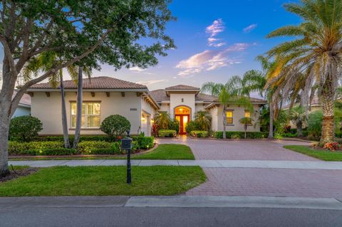 Photo of 9986 SW Nuova Way, Port Saint Lucie, FL 34986 (MLS # R11141831)