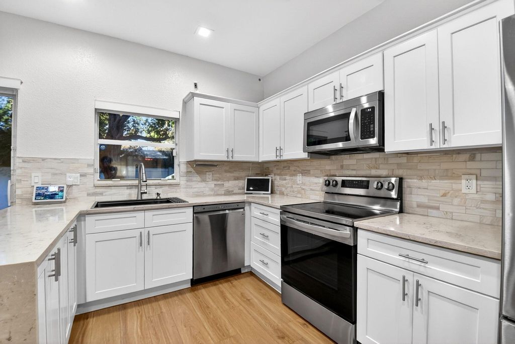 Photo of 5856 Erik Way, Greenacres, FL 33463 (MLS # R11166872)