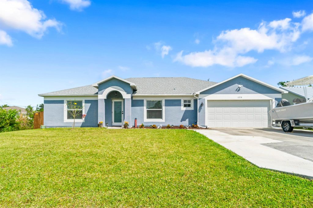 Photo of 1279 SW Patricia Avenue, Port Saint Lucie, FL 34953 (MLS # R10972866)