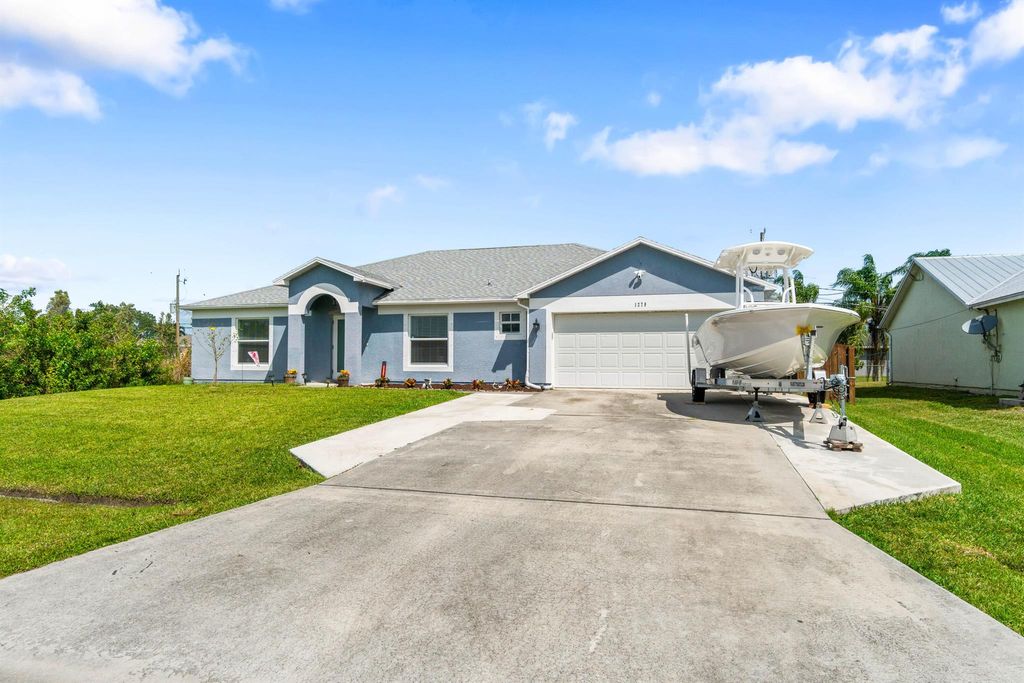 Photo of 1279 SW Patricia Avenue, Port Saint Lucie, FL 34953 (MLS # R10972866)