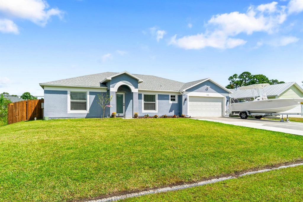 Photo of 1279 SW Patricia Avenue, Port Saint Lucie, FL 34953 (MLS # R10972866)
