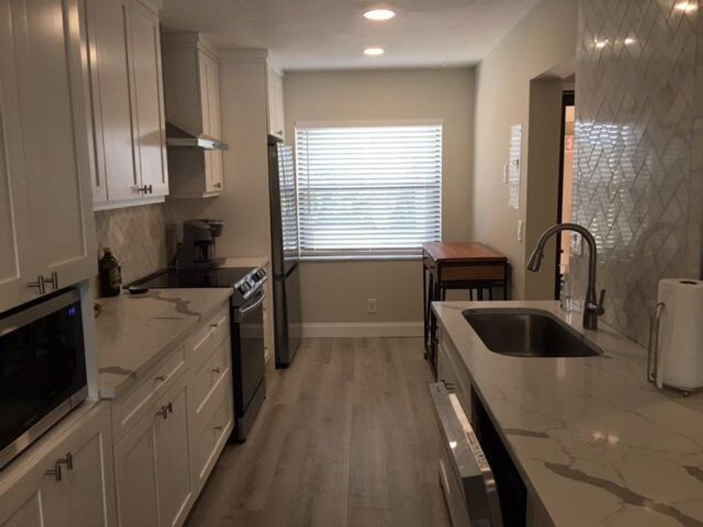 Photo of 6962 Briarlake Circle #202, Palm Beach Gardens, FL 33418 (MLS # R11081422)