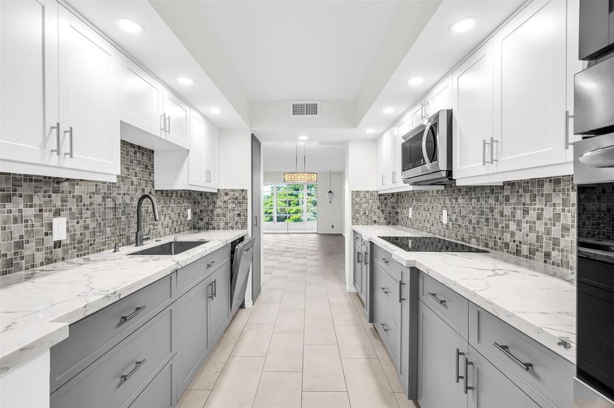 Updated 2-bedroom, 2-bath condo in the beautiful gated community of Wynmoor, Coconut Creek. Enjoy resort-style living with a spacious layout, modern finishes, and serene surroundings. Wynmoor offers incredible amenities, including a clubhouse, fitness center, pools, tennis courts, golf, and 24-hour security. Beautifully maintained landscaping and a quiet atmosphere create the perfect retreat. Conveniently located near shopping, dining, and major highways for easy access to everything Coconut Creek offers.