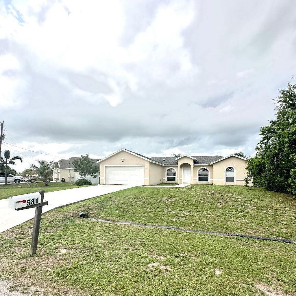 Photo of 581 SW Fields Avenue, Port St Lucie, FL 34953 (MLS # R10884862)