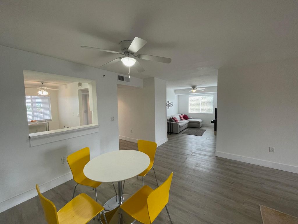 Photo of 6080 Huntwick Terrace #401, Delray Beach, FL 33484 (MLS # R10944585)