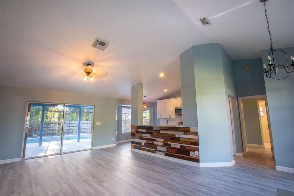 Welcome home to this beautifully remodeled 3 BR, 2 BA, 2 CG home with a detached CBS workshop on the property. New kitchen, new floors, new master bath, fresh interior and exterior paint with a pool. This wonderful open floor plan gives amazing light throughout the entire home and offers a great flow from indoor to outdoor living. With easy access to the turnpike and 95 this home is perfectly located in the Becker and Darwin area of Port Saint Lucie.