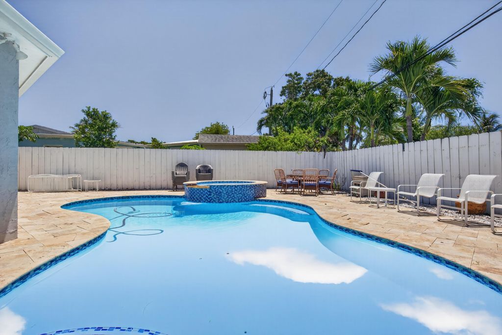 Photo of 650 NW 38th Place, Deerfield Beach, FL 33064 (MLS # B26027956)