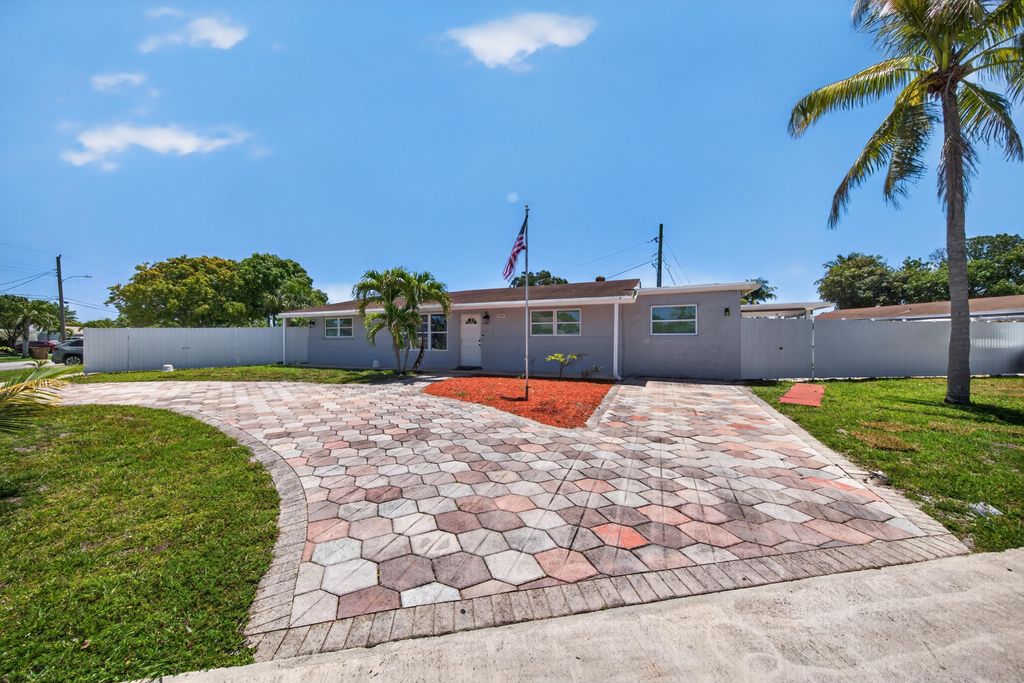 Photo of 650 NW 38th Place, Deerfield Beach, FL 33064 (MLS # B26027956)