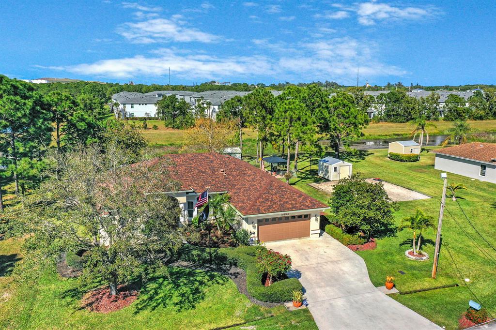 Photo of 5462 NW Boydga Avenue, Port Saint Lucie, FL 34986 (MLS # R10779213)
