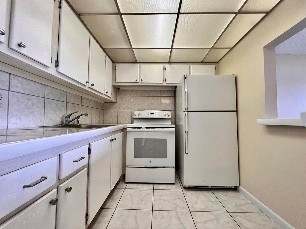 Photo of 403 Chatham T, West Palm Beach, FL 33417 (MLS # R11147349)