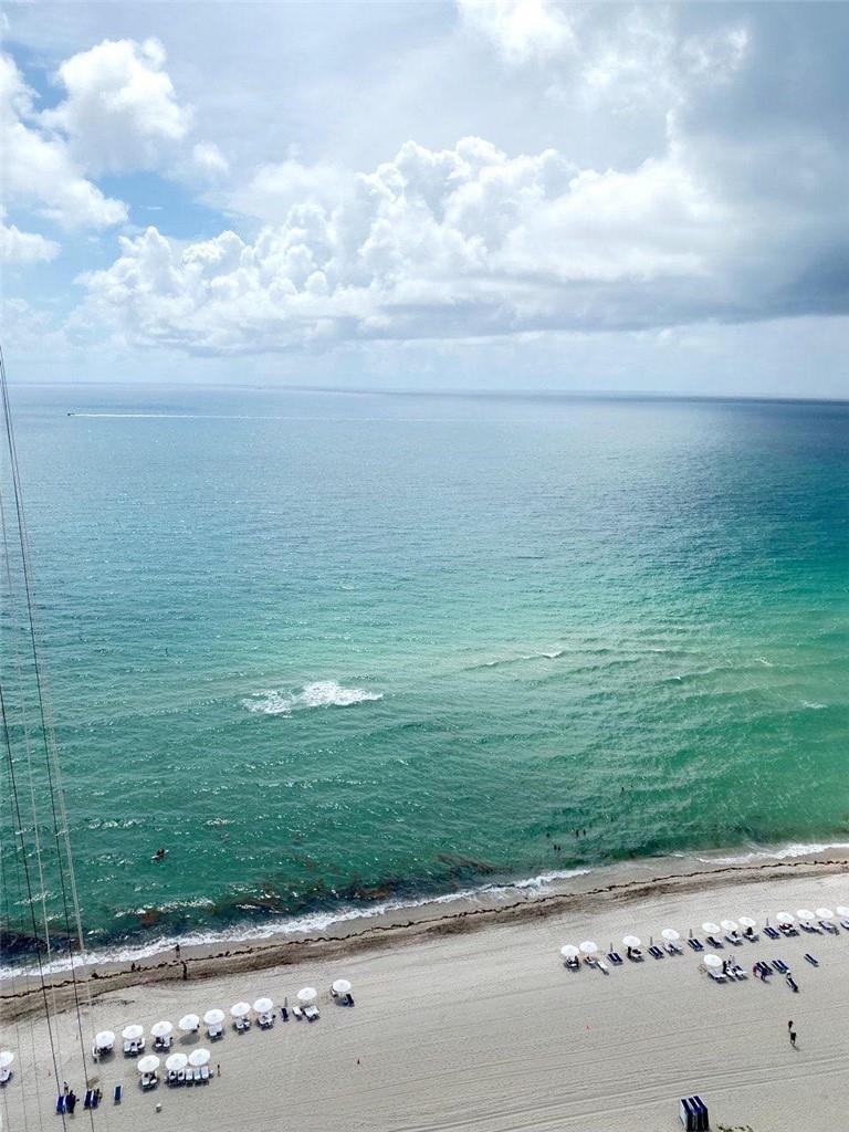 BREATHTAKING OCEANFRONT. 2 BEDROOMS + DEN. & 3 BATH. GORGEOUS UNIT WITH OCEAN, INTRACOASTAL & CITY VIEWS. PRIVATE ELEVATOR, FLOOR-TO-CEILING IMPACT WINDOWS, OPEN KITCHENW/BUILT-IN BOSCH COFFEE MACHINE, SUBZERO FRIDGE, AND WOLF STOVE, WASHER/DRYER AND MUCH MORE *** FIVE STARS RESORT AMENITIES INCLUDE TWO-STORY GYM, SPA, RESTAURANT, BEACH SERVICE, 24HR SECURITY, CONCIERGE & COMPLIMENTARY VALET *** PRIME LOCATION: CLOSE TO BAL HARBOUR SHOPS, RESTAURANTS, AVENTURA MALL *** SHOWINGS BY APPOINTMENT ONLY,. DON'T MISS OUT.....