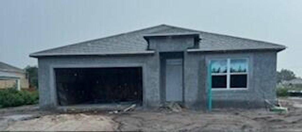 Photo of 402 SW Friar Street, Port Saint Lucie, FL 34983 (MLS # R11005120)