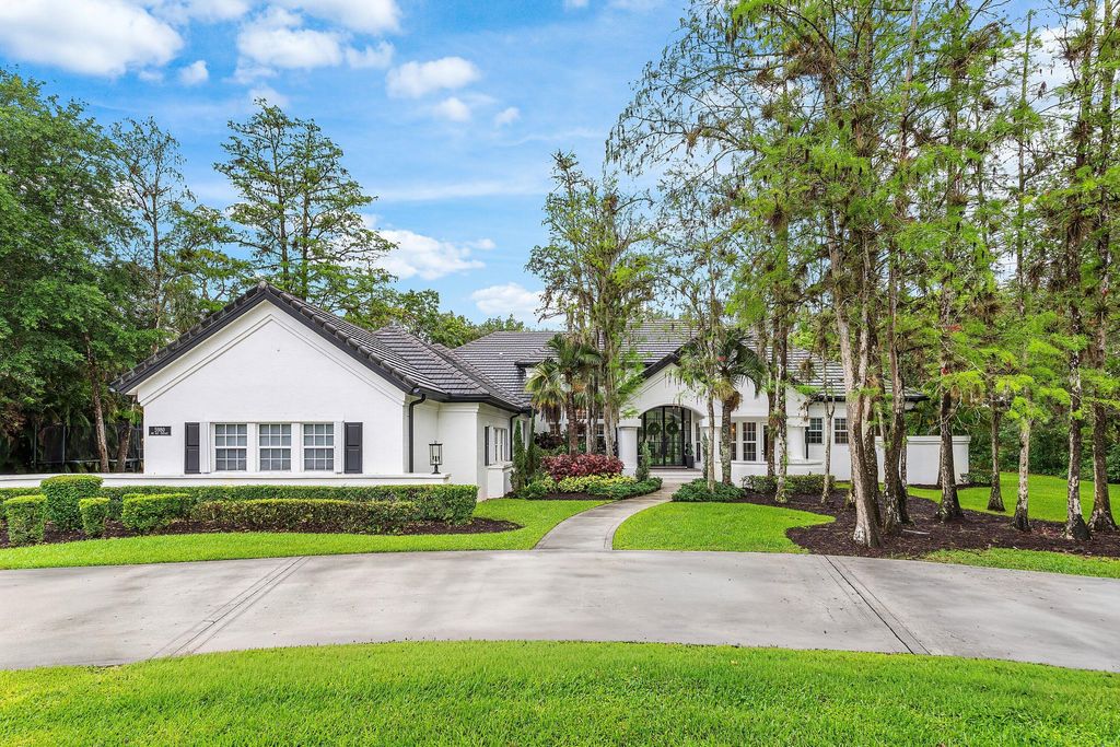 Photo of 5980 NW 81st Terrace, Parkland, FL 33067 (MLS # B26014627)