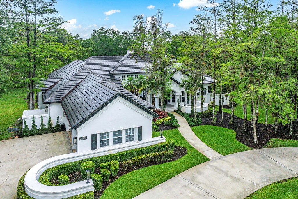 Photo of 5980 NW 81st Terrace, Parkland, FL 33067 (MLS # B26014627)