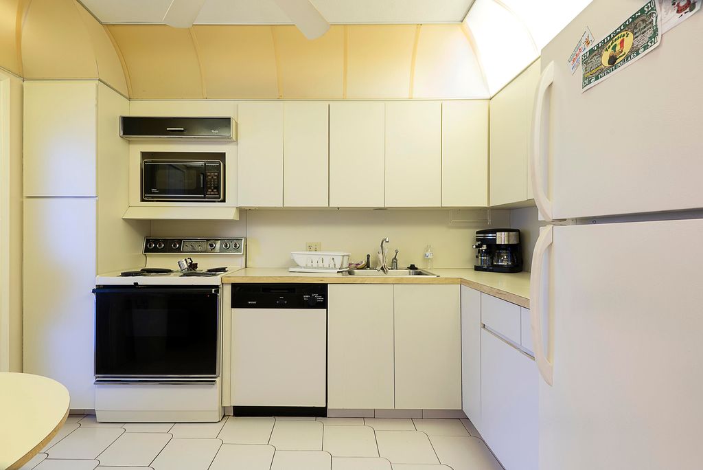 Photo of 3051 N Course Drive #211, Pompano Beach, FL 33069 (MLS # B26011567)