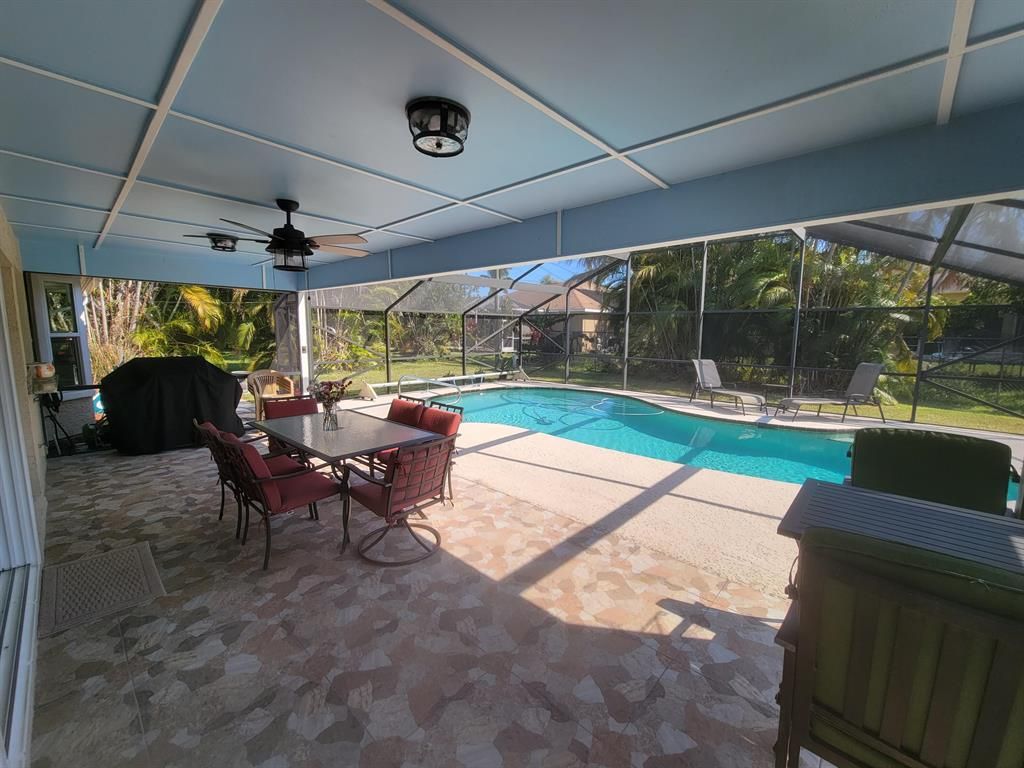 Photo of 2415 SW Mountwell Street, Port St Lucie, FL 34984 (MLS # R10869513)