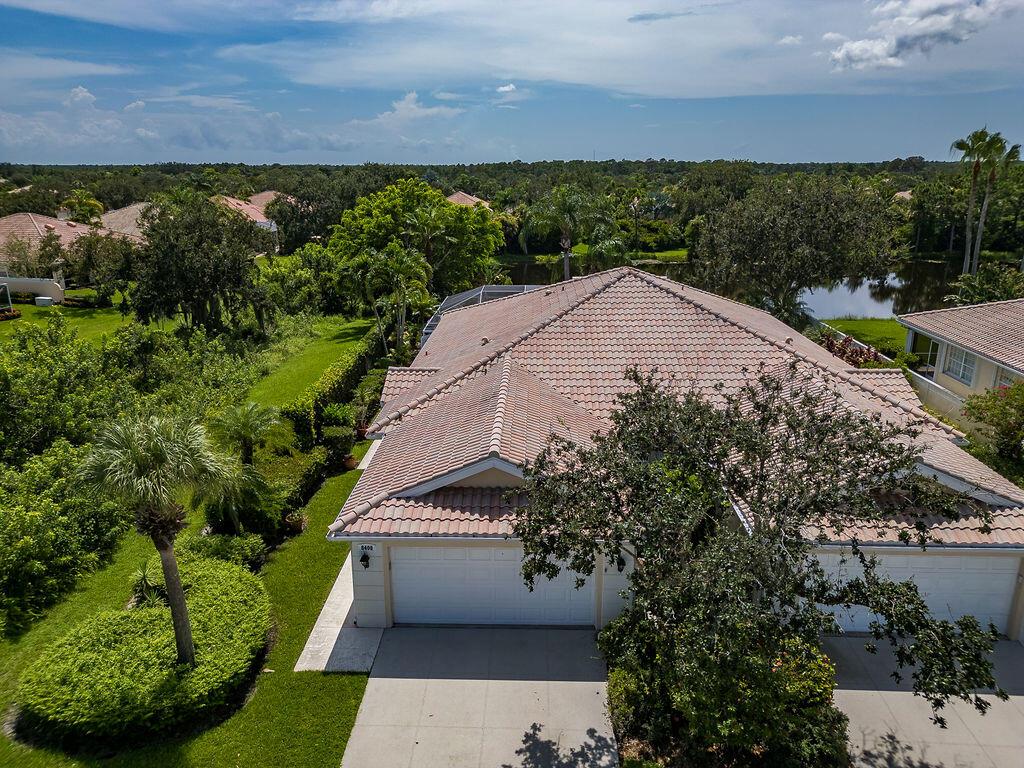 Welcome to your seasonal pool home in Hobe Sounds desirable Lost Lake community. Now available for season 25/26. This beautiful 2/2 with 2 car garage is nestled at the end of a cul de sac. The light and bright villa boasts an idyllic lake view and is very private. Step inside to discover an inviting open - concept living space, enhanced by an added on living room that creates a perfect setting for relaxation or entertaing visitors. Lost Lake is close to local restaurants and shops, several golf communities and beaches. Enjoy the Florida lifestyle in this comfortable villa with brand-new roof added in 2025.