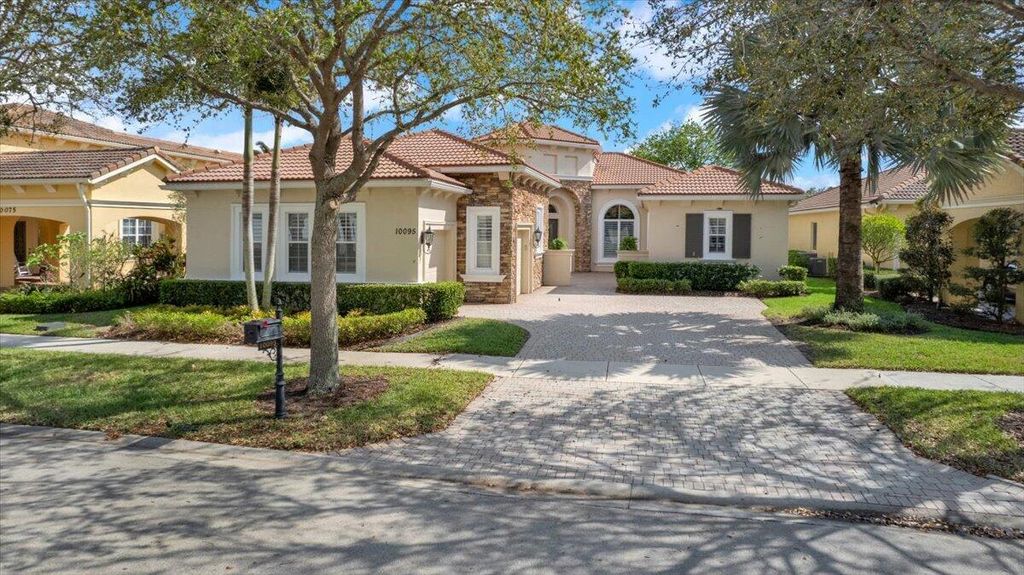 Photo of 10095 SW Nuova Way, Port Saint Lucie, FL 34986 (MLS # B26004314)