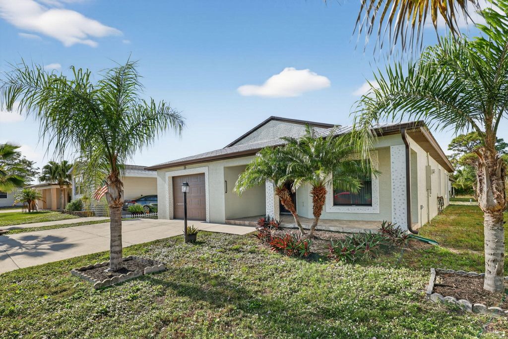 Photo of 35 S Alhambra Lane, Port Saint Lucie, FL 34952 (MLS # R11146597)