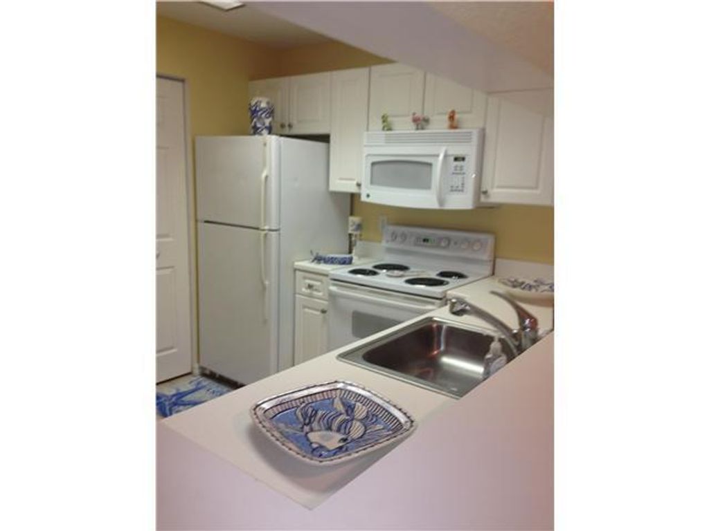 Photo of 2916 Tuscany Court #202, Palm Beach Gardens, FL 33410 (MLS # R10865511)