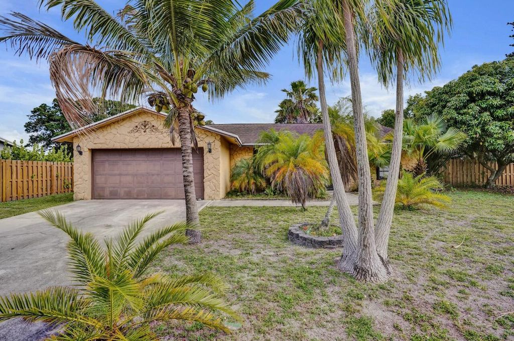 Photo of 125 Seagull Court, Royal Palm Beach, FL 33411 (MLS # B26029500)
