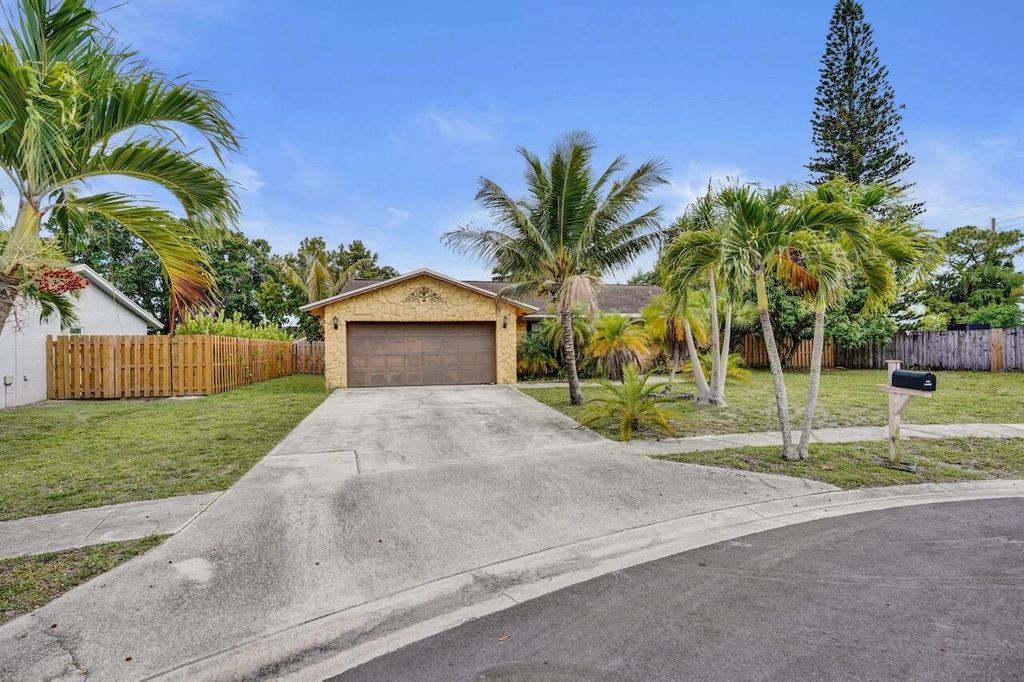 Photo of 125 Seagull Court, Royal Palm Beach, FL 33411 (MLS # B26029500)