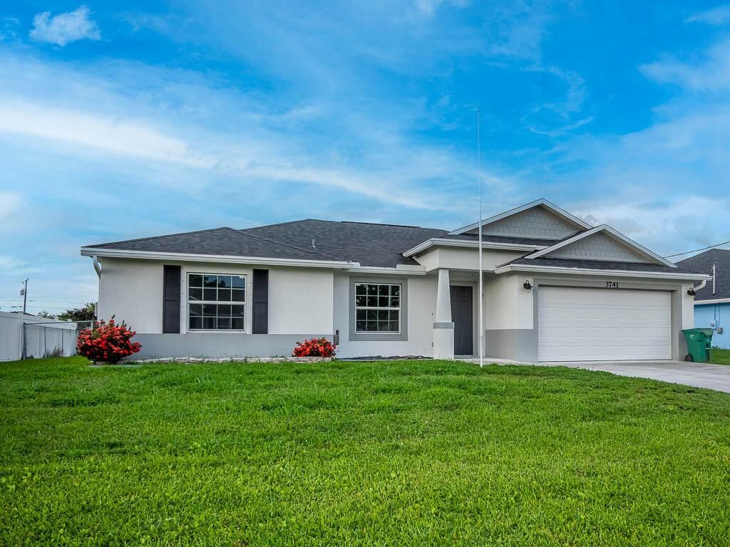 Photo of 3741 SW Wycoff Street, Port St Lucie, FL 34953 (MLS # R10896462)