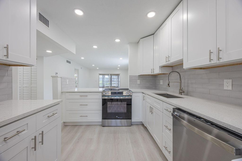 Photo of 2805 Casita Way #215, Delray Beach, FL 33445 (MLS # R11119993)