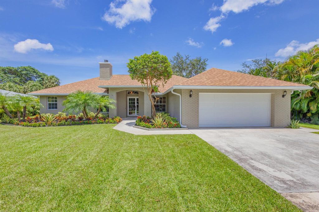 Photo of 8784 N Virginia Avenue, Palm Beach Gardens, FL 33418 (MLS # R10899460)