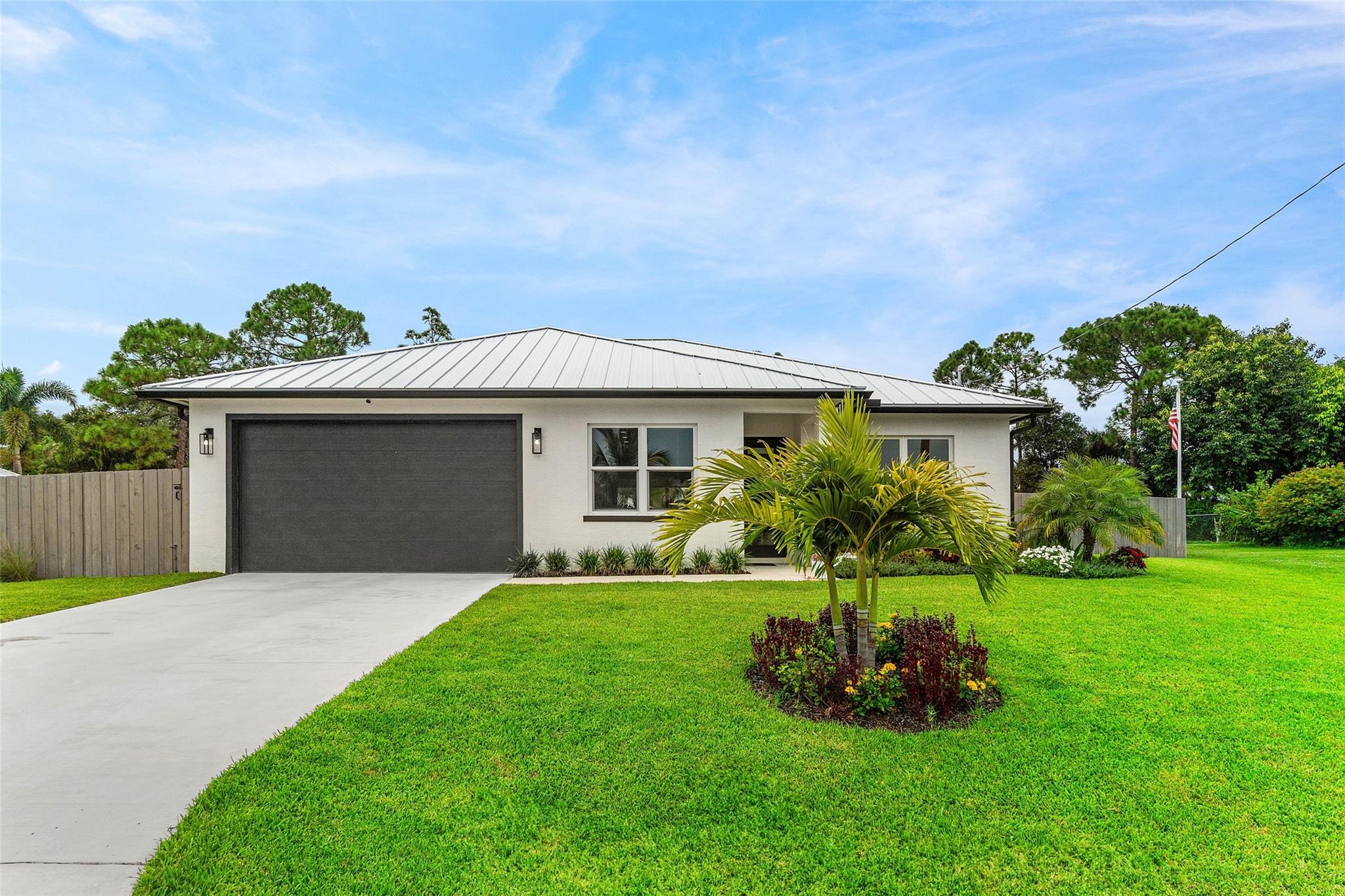 Stunning New Custom-Built Home, Completed in August of 2024, featuring top-of-the-line finishes, modern design, and every luxury upgrade imaginable. This stunning pool home delivers privacy, comfort, and modern elegance. Set on a 13,068 sq ft lot with no HOA, it features an open floor plan with a chef’s kitchen, waterfall island, premium LG appliances, and designer finishes throughout. The bright, airy layout is ideal for both relaxing and entertaining. Step outside to a private oasis with a custom pool and a 14’ x 32’ covered lanai designed for outdoor dining and lounging. With every upgrade included, this home offers the perfect balance of timeless design and everyday convenience.