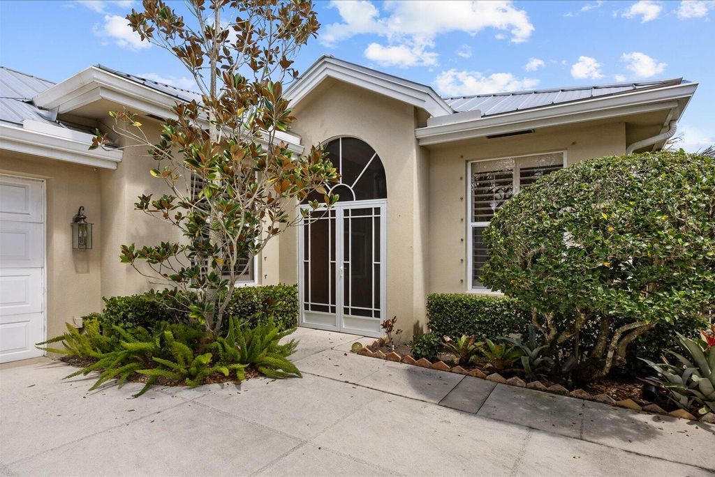 Photo of 2856 SW Brighton Way, Palm City, FL 34990 (MLS # B26000813)