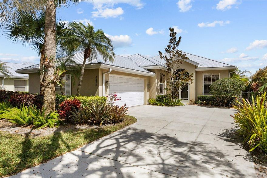 Discover this immaculate Divosta poured concrete Hampton model on a premium private lakefront lot featuring a heated resurfaced pool & lush screened outdoor oasis. Major upgrades include 2018 metal roof, full re-pipe (poly removed) new A/C 2021, upgraded electrical panel 2022, impact front door 2022, new pool equipment/ heater. Interior highlights include porcelain tile floors, crown molding, plantation shutters, custom breakfast nook & sliders opening to opening to the covered lanai & pool. Located in  gated Meadows community at Martin Downs with tennis, pickleball, pool, & playground. Quality built by renowned Divosta.