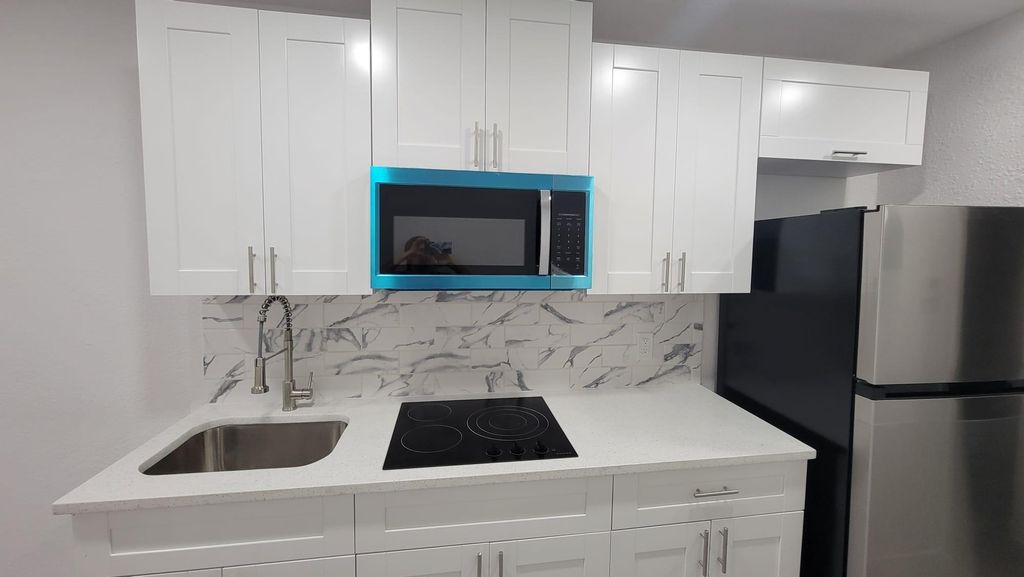 Photo of 618 SW 14th Terrace #4, Fort Lauderdale, FL 33312 (MLS # F10513109)