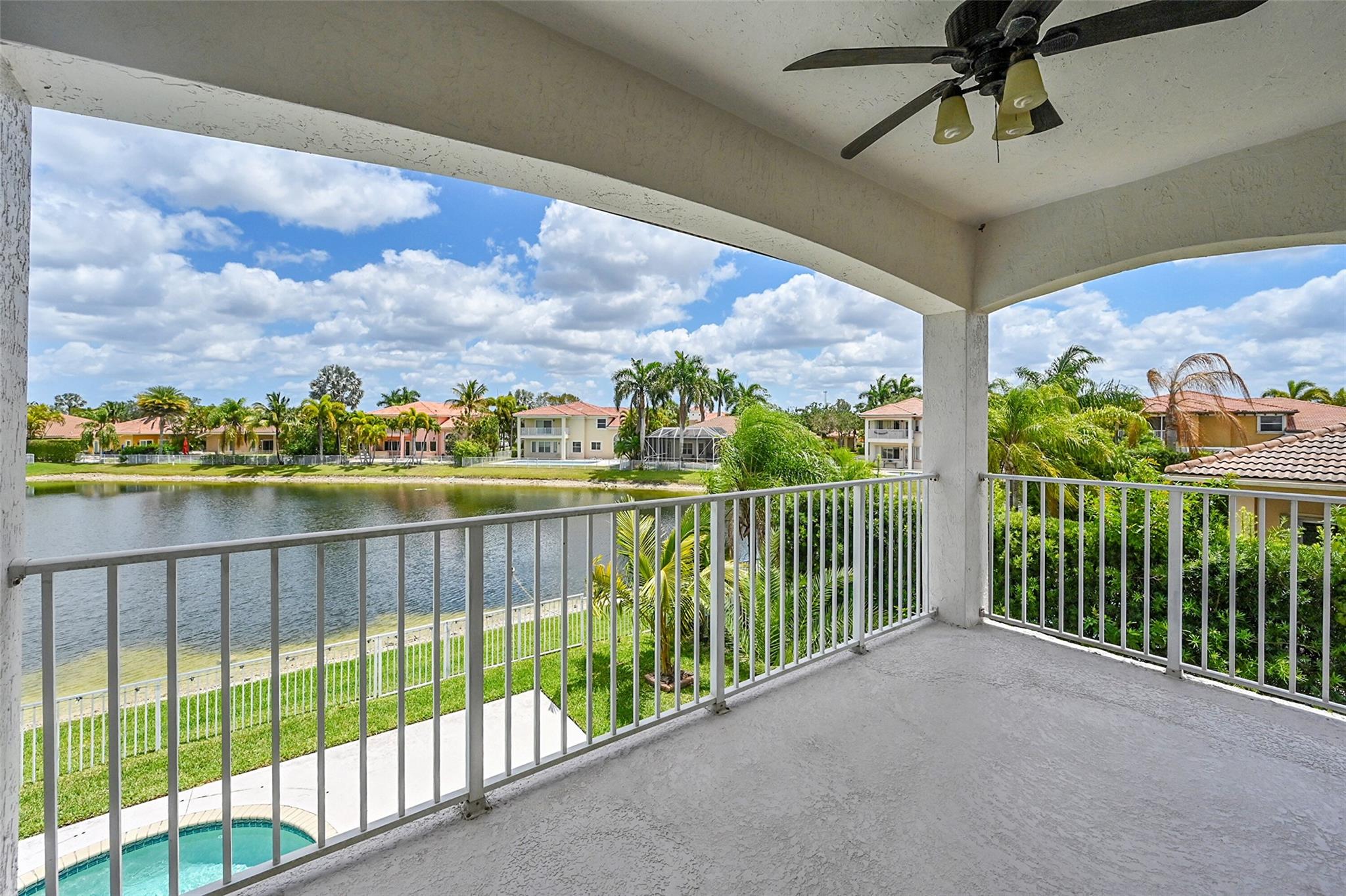 Unbelievable opportunity in Bay Pointe in Wyndham Lakes! This highly sought-after castle model home is a must-see, featuring a brand-new roof and an elegant spiral staircase leading to a loft, perfect for your workspace. Enjoy the beautiful terrace from the primary bedroom, abundant closet space is an understatement. Let's not ignore the breathtaking water views. This home also boasts two bedrooms on the first floor, one is a full ensuite. The other 3 bedrooms, including the huge primary is on the 2nd floor. Located in a gated community with top-rated schools, this home is a dream come true. Once you arrive, you'll never want to leave. Don't wait—make this stunning residence yours today! This will be the last time you will need to pack your bags...You will never want to leave home again!