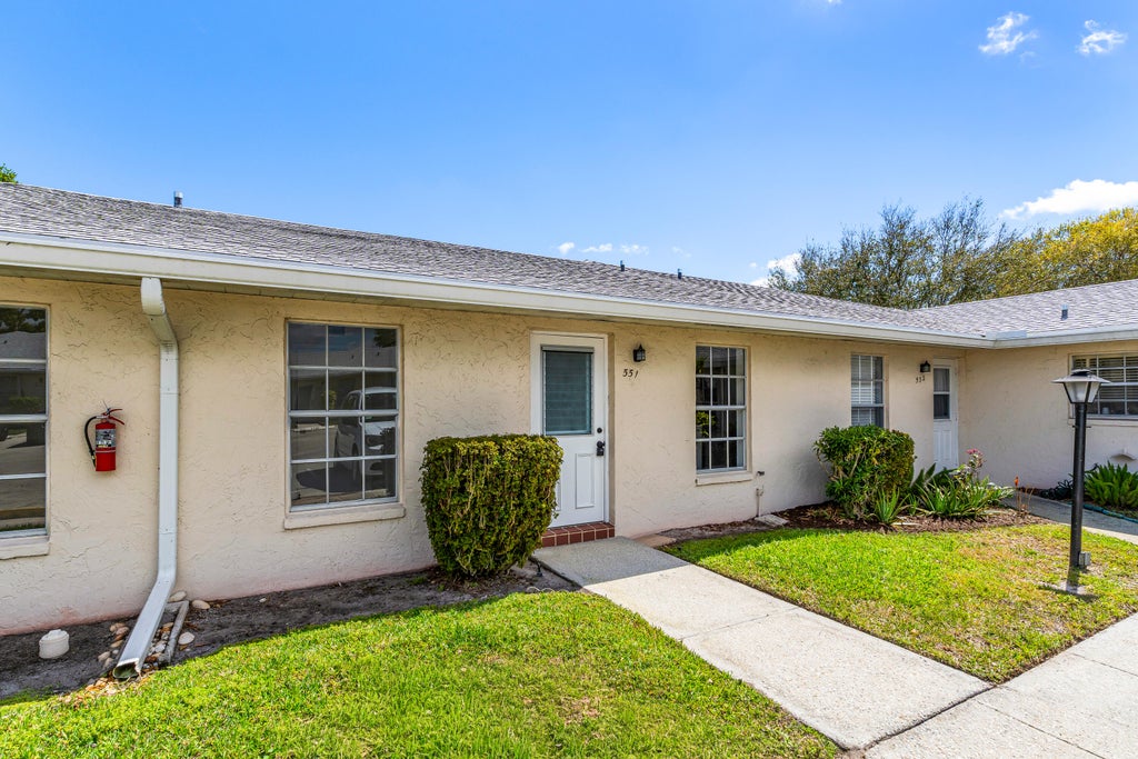 Photo of 551 Covered Bridge Boulevard, Lake Worth, FL 33467 (MLS # B26001296)