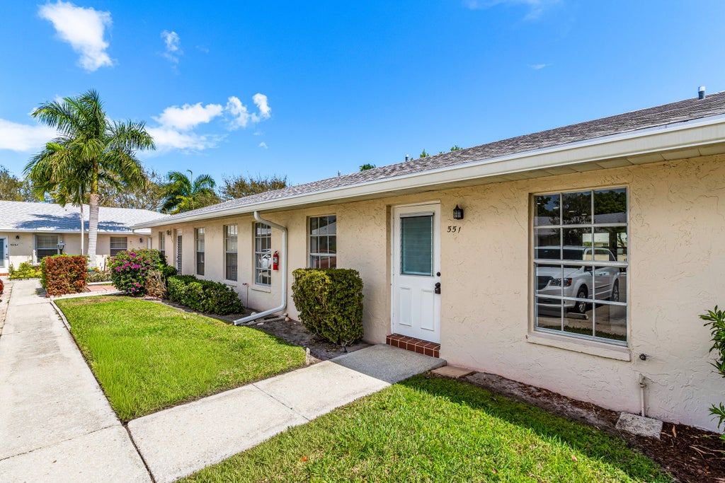 Photo of 551 Covered Bridge Boulevard, Lake Worth, FL 33467 (MLS # B26001296)
