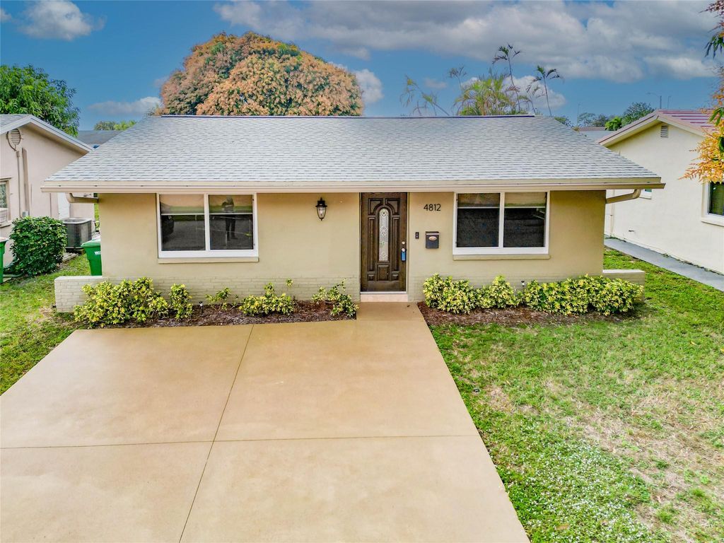 Photo of 4812 NW 50th Court, Tamarac, FL 33319 (MLS # F10478998)