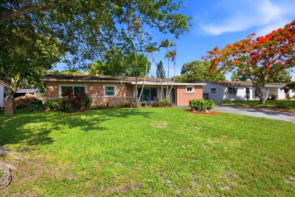 Photo of 1671 N Cypress Road, Pompano Beach, FL 33060 (MLS # B26042045)