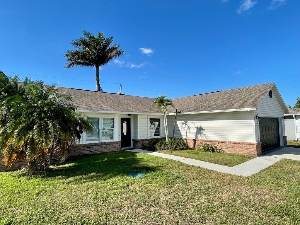Photo of 1972 SW Breezeway Street, Port Saint Lucie, FL 34953 (MLS # R10771189)