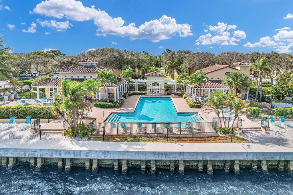 Photo of 1030 Lake Shore 103 Drive #103, Lake Park, FL 33403 (MLS # R11043739)