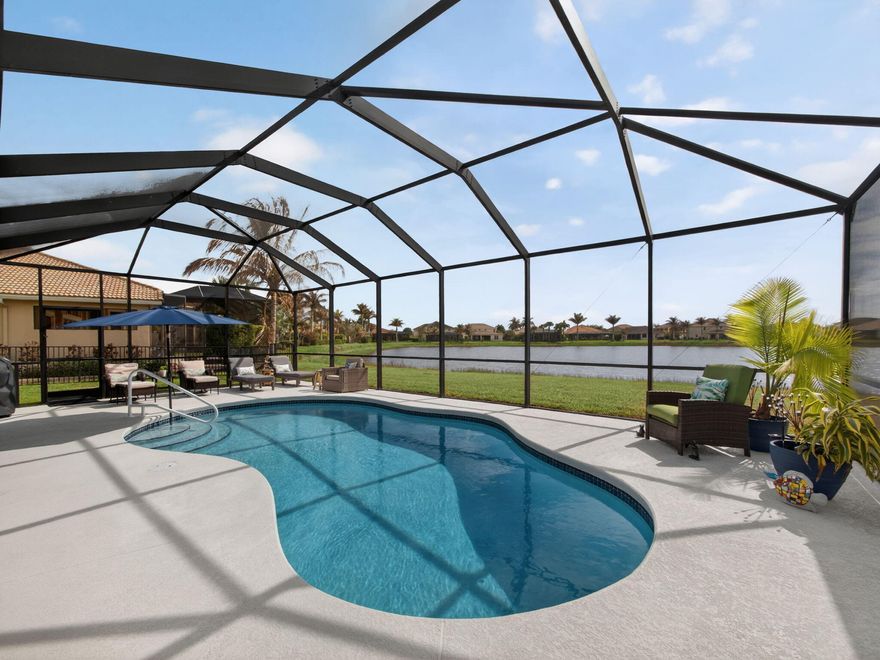 Welcome to this beautifully updated 3-bedroom with expanded master suite and 3-bathroom pool home located in The Estates at Tradition. This move-in-ready residence showcases numerous recent upgrades, including brand-new carpeting throughout, a new washer and dryer, new dishwasher, new hot water heater, new pool heater, and new pool filter--offering peace of mind and modern convenience from day one. The heated pool provides year-round enjoyment, creating the perfect private backyard retreat. Designed for both everyday living and entertaining, the spacious floor plan flows effortlessly from the main living areas to the outdoor oasis. The fully fenced yard offers privacy and security, ideal for gatherings, pets, or simply relaxing poolside. Residents of The Estates at Tradition enjoy access to scenic walking trails just steps from the home, enhancing the walkable, resort-style lifestyle that makes Tradition so highly sought after. Ideally positioned within one of Tradition's premier estate communities, this exceptional lakefront residence offers a rare combination of luxury, privacy, and thoughtfully curated upgrades--all set within a truly distinguished setting, all just minutes from shopping, dining, and major roadways.