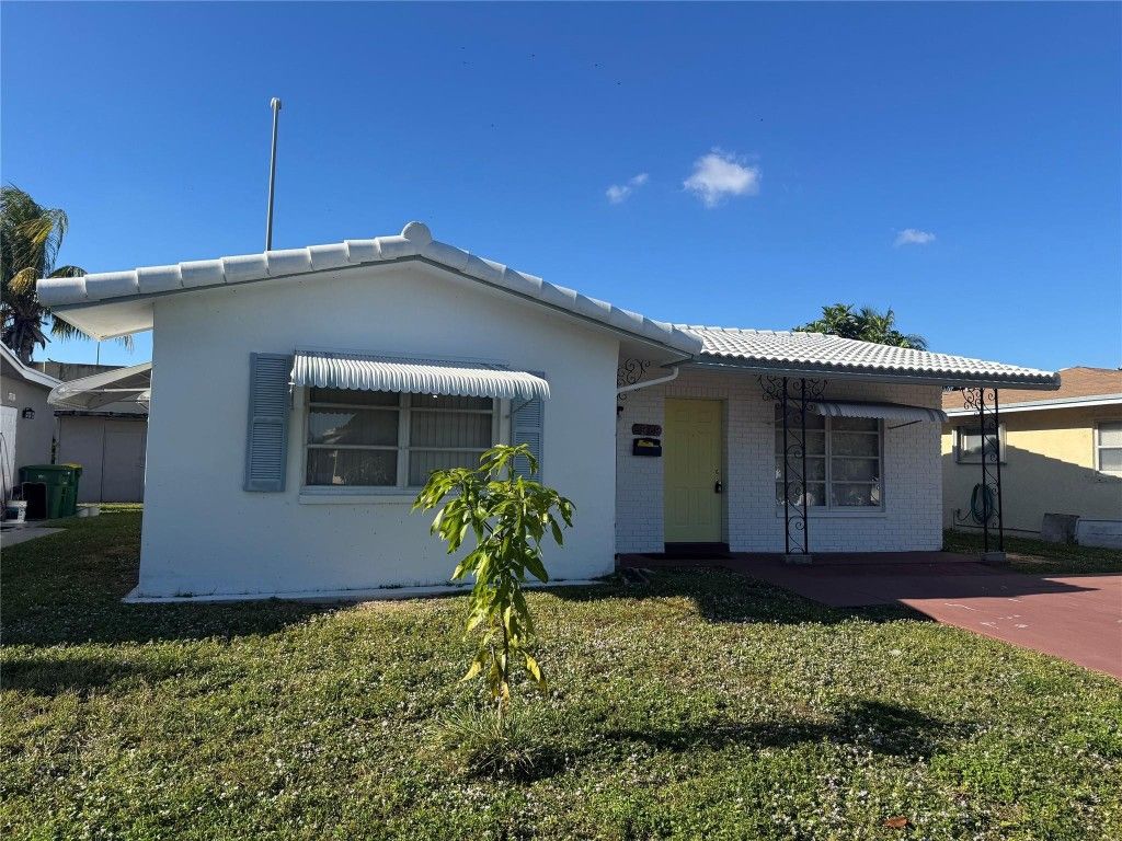 Photo of 4949 NW 48th Way, Tamarac, FL 33319 (MLS # F10538253)